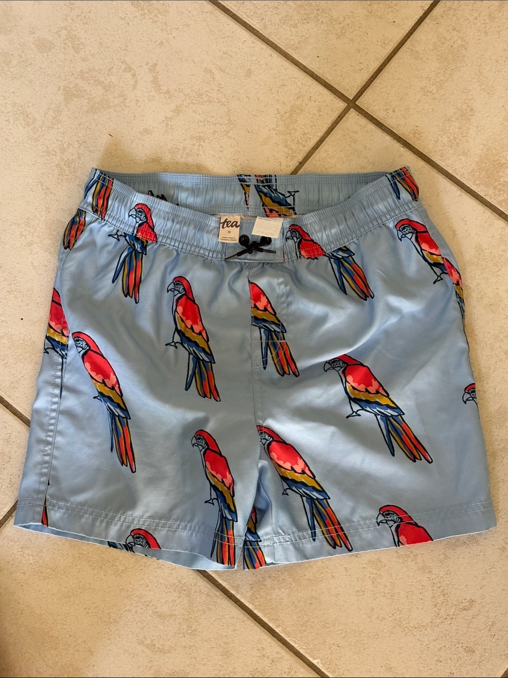 Tea Collection Light Blue Parrot Print Swim Trunks